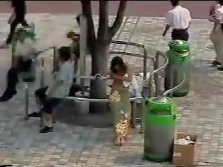 Changing in the street - Japanese daughter in public part one