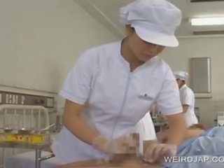 Gang bang with asian girls giving hand job