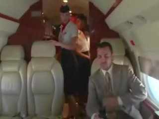 Desiring stewardesses suck their clients hard phallus on the plane