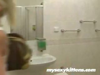 Sporty fancy woman works her wet pussy with a dildo