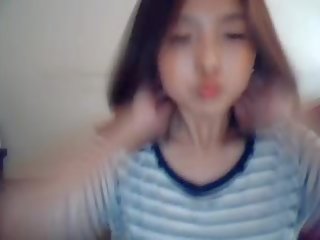 Coreana nena en web cámara